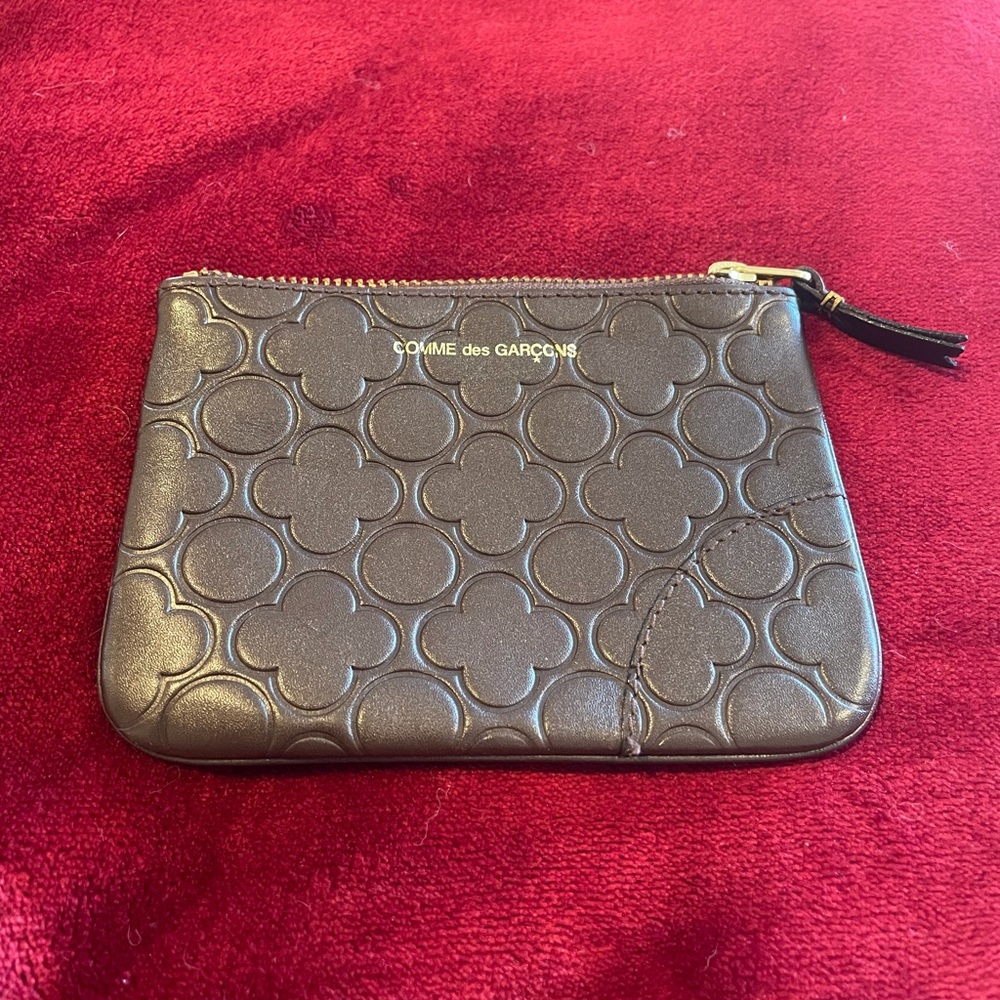 Comme des Garçons embossed leather zippered wallet